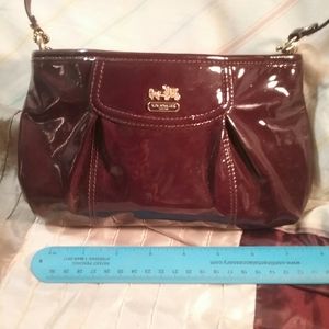 Patent maroon evening bag by Coach